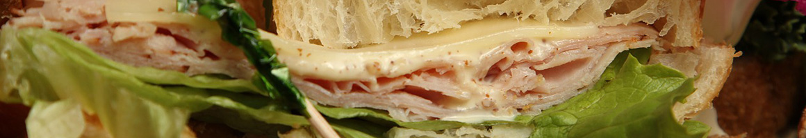 Eating Italian Sandwich at Devine Pastabilities, Torpasta of San Diego restaurant in San Diego, CA.